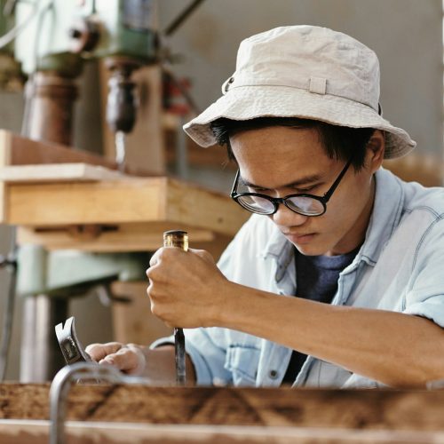 Creative Man Carving Wood
